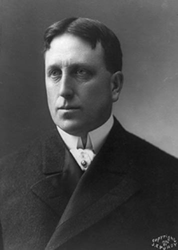 A black and white portrait of William Randolph Hearst.