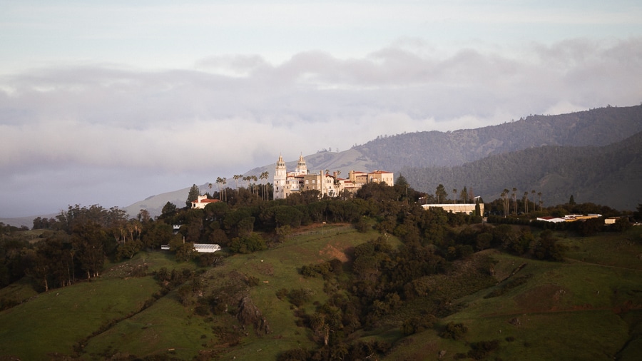 A view of Hearst Castle in the evening with both bell towers of Casa Grande visible.