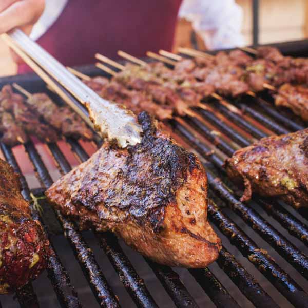 Hearst Ranch Beef being grilled.